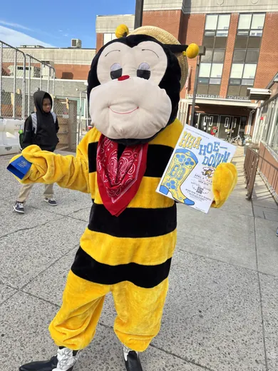 The hornet handing out flyers
