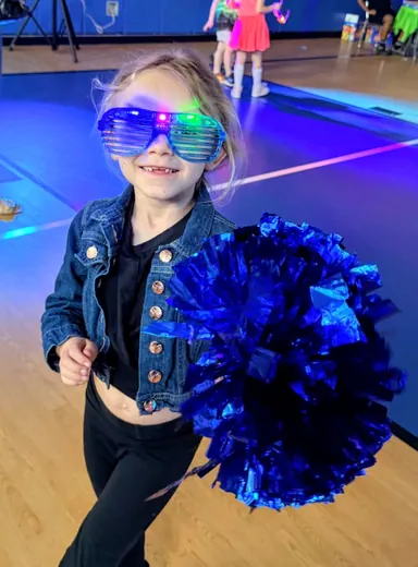 Glow glasses and blue pom-poms