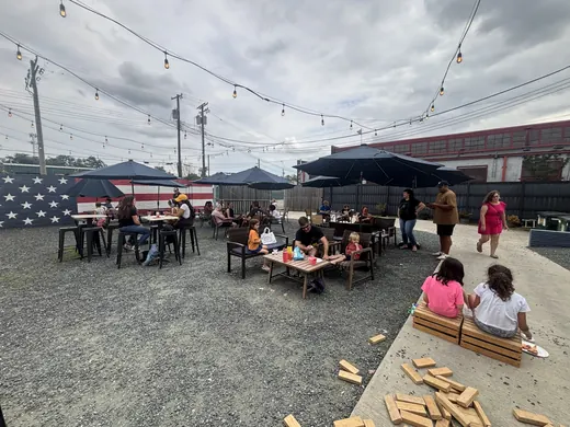 Families spread across the patio