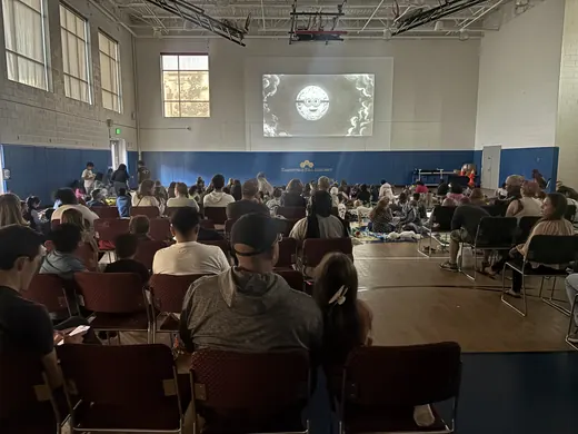Rows of chairs facing the screen