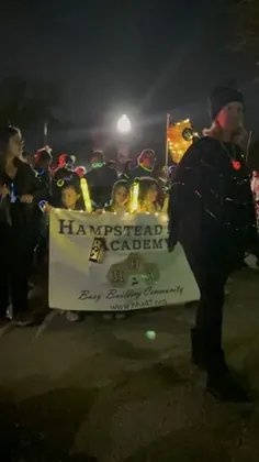 The HHA banner in the lantern parade
